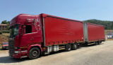 Scania R580 centinato con biga Omar 