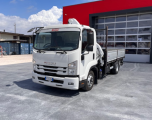 Isuzu F11.210 con gru e cassone fisso