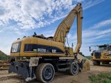 Caterpillar Pinza MH325D